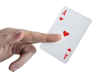 human hand holding the ace of hearts