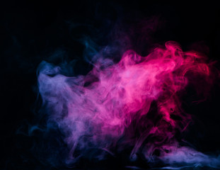 Fototapeta na wymiar multicolor smoke on black background