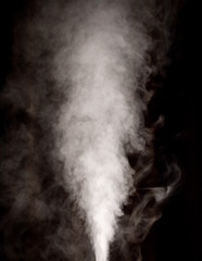 White vapor on the black background