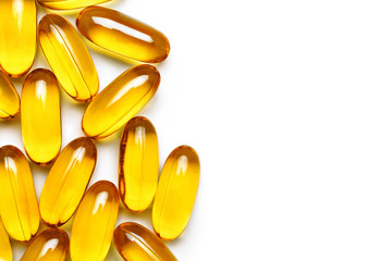 Close up of capsules Omega 3 on white background. Copy space for your text. Top view, high...
