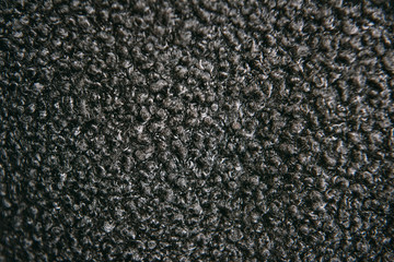 the fabric is made of black wool for the background