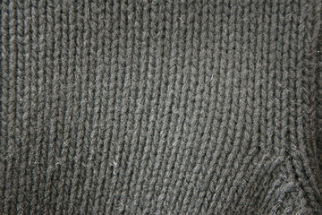 woolen fabric of dark color for the background