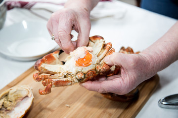Preparing cooked crab