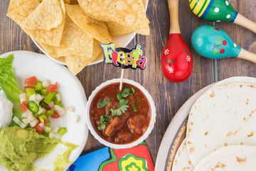 Fiesta decorated table with maracas.