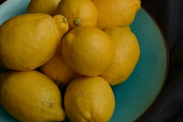 Lemons on the blue plate