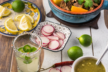 Mexican food. Slow cooked pork carnitas with salsa verde