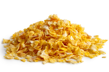 Heap of dry flaked corn isolated on white.