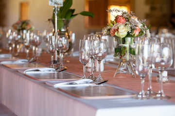 Table decorated with flowers at wedding reception