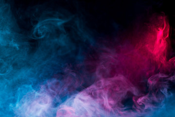 Obraz na płótnie Canvas multicolor smoke on black background