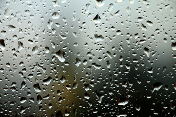 Rain drops on window , rainy day 