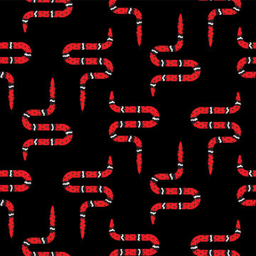 Red micrurus snake on black seamless pattern vector. Serpent fabric print wild reptile animal.