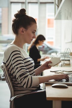 Business executive using laptop