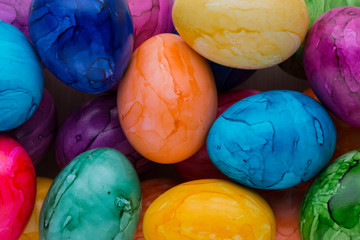 Easter eggs painted in colors on a white background.
