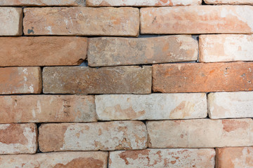 Weathered red brick wall texture seamlessly tileable