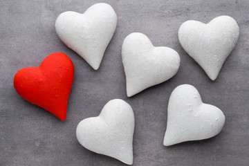 Red hearts on the gray background. Valentine Day background.