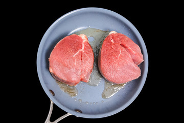 Steak Chateaubriand roasted in a frying pan. Insulated.