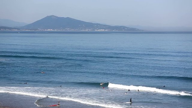 Surfers at Biarritz beach