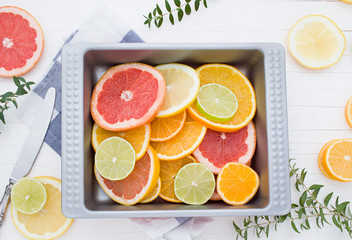 Bright citrus in a tray. Top view