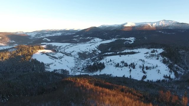 AERIAL: Flight over the river in winter