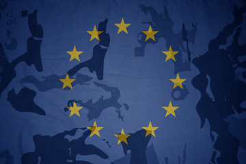 flag of european union on the khaki texture . military concept
