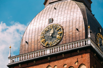 Clock On Tower Of Riga Dome Cathedral In Riga, Latvia. Sunny Sunset