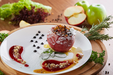 Baked roast apple dish with nuts 