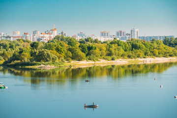 Fototapeta premium People Fishing From Rowing Boat In Sozh River In Gomel, Belarus.