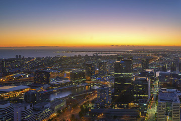 An aerial view of Melbourne cityscape at sunset