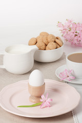 Hyacinth Flowers. Amaretti Biscuits. Boiled Egg. Cup Of Tea