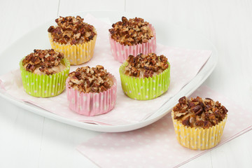 Colorful Homemade Cupcakes With Pecan And Maple Syrup.