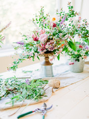 Florist make bouquet for wedding