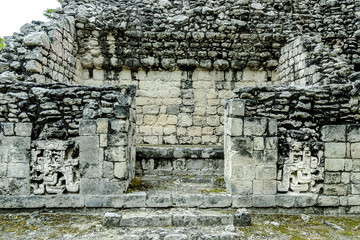 temple in ruins with reliefs in the Mayan archaeological Chicanna enclosure in the reservation of the biosphere of Calakmul, Campeche, Mexico