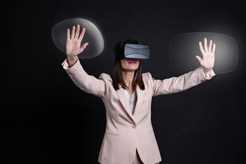 Businesswoman playing virtual reality simulation