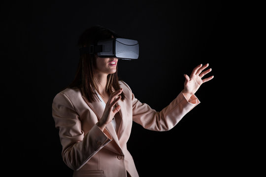 Businesswoman playing virtual reality simulation