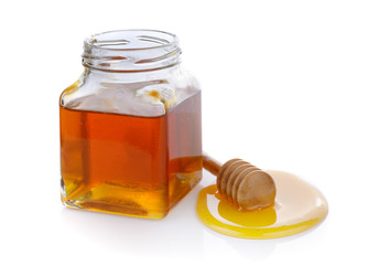 Honey with wooden honey dipper