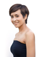 Attractive woman smiling and wearing black tube top isolated on white background