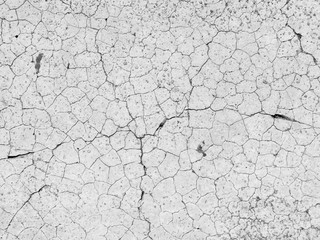 Cracked concrete texture closeup background