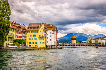 City center with famous Chapel Bridge and lake in Lucerne, Switzerland
