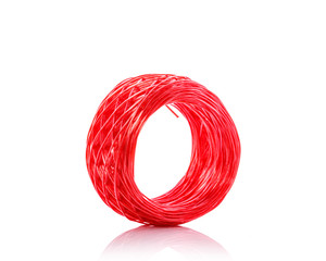 Red plastic rope. Studio shot isolated on white