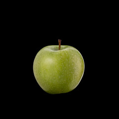 Green apple. Studio shot isolated on black