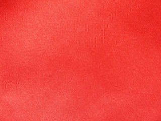 Fototapeta premium Red silk fabric background