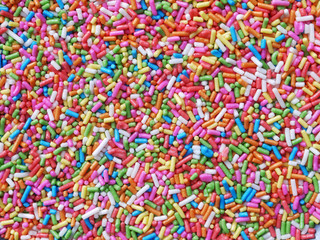 Fototapeta na wymiar colorful sugar sprinkles as background