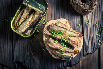 Healthy sandwich wirh sardines with on the wholegrain bread - obrazy, fototapety, plakaty