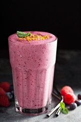 Berry smoothie in a tall glass
