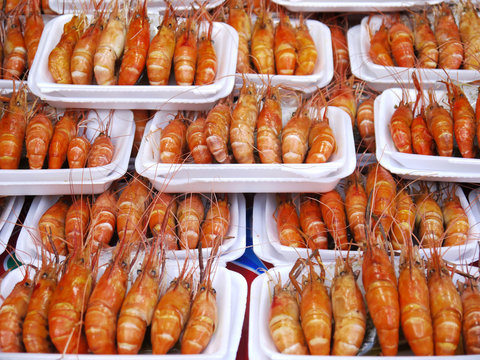 Close Up Detail Of The Grilled Large River Prawn Serve In White Plastic Plate In The Street Food Stall In Thailand