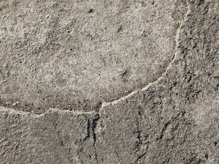 Cracked concrete floor texture closeup background