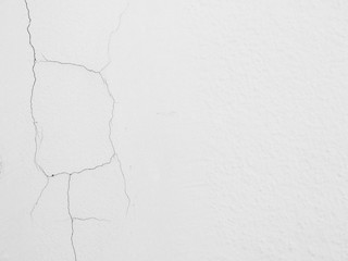 white wall with cracks