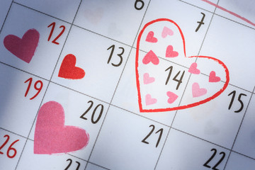 Date 14 in calendar with heart sign. Valentine day and love conc