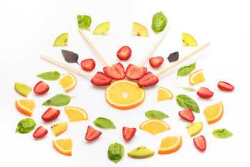 strawberry, green mint leaves and orange isolated on white
