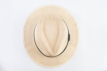 Top view of straw hat isolated on white background.